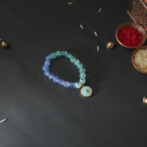 Evil Eye Bracelet Rakhi for Kids – Blue Beaded Design with Handmade Protective Charm
