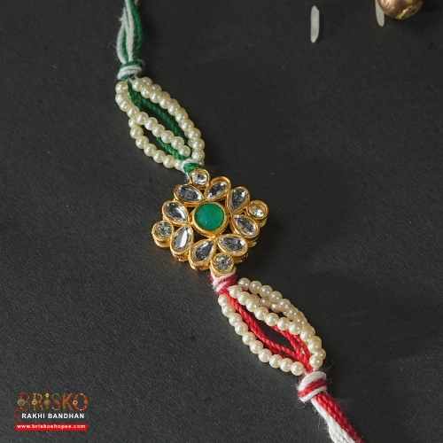 Elegant Pearl Flower Rakhi with Tricolor Thread – Graceful Handmade Rakhi for Brother