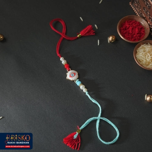 Red & Blue Evil Eye Handmade Rakhi – Stylish Protection for Brother