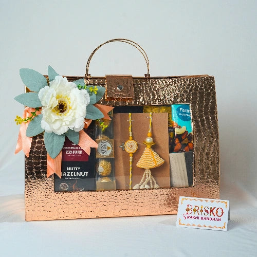 Premium Copper Bag Rakhi Gift Hamper – Luxury Celebration Set with Pair of Rakhi & Gourmet Treats