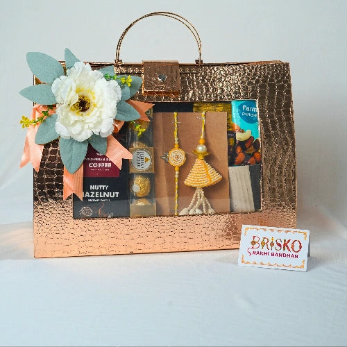 Premium Copper Bag Rakhi Gift Hamper – Luxury Celebration Set with Pair of Rakhi & Gourmet Treats