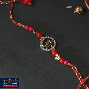 Om Symbol Rakhi on Red Thread – Spiritual Blessings for Brother
