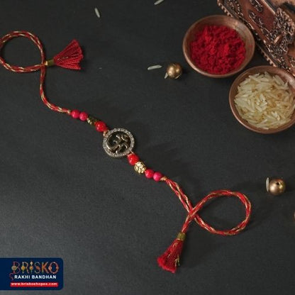 Om Symbol Rakhi on Red Thread – Spiritual Blessings for Brother