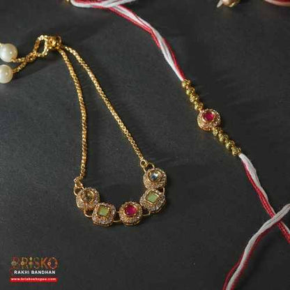 Antique Pearl Drop Lumba Pair Rakhi – Regal Elegance for Bhaiya Bhabhi