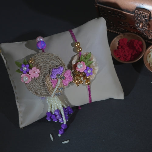 Handmade Bhaiya Bhabhi Rakhi Pair – Rustic Jute Floral Design with Pearls & Purple Tassels