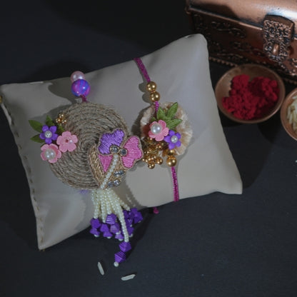 Handmade Bhaiya Bhabhi Rakhi Pair – Rustic Jute Floral Design with Pearls & Purple Tassels