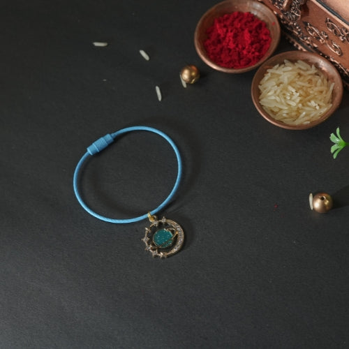 Planet Bracelet Rakhi for Kids – Galaxy-Themed Design with Handmade Charm Detailing