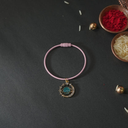 Planet Bracelet Rakhi for Kids – Galaxy-Themed Design with Handmade Charm Detailing