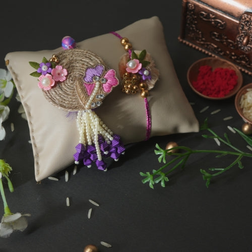 Handmade Bhaiya Bhabhi Rakhi Pair – Rustic Jute Floral Design with Pearls & Purple Tassels