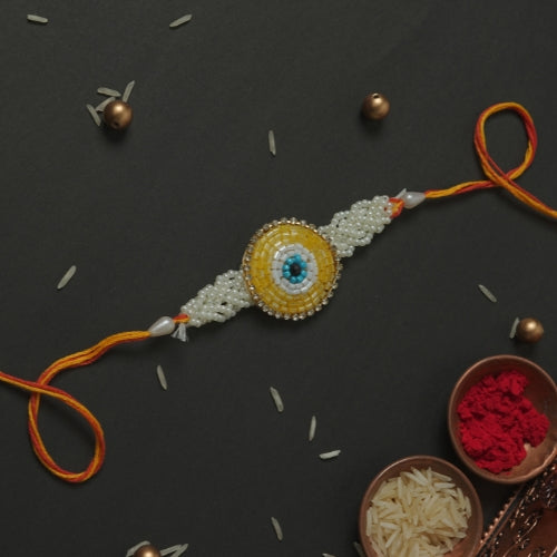 Handmade Rakhi – Yellow Beaded Rakhi with Pearls on Orange Thread