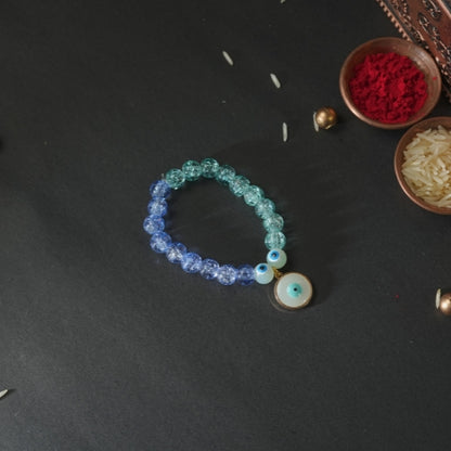 Evil Eye Bracelet Rakhi for Kids – Blue Beaded Design with Handmade Protective Charm