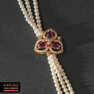 Regal Pearl Bloom Rakhi – Graceful Bond with Every Thread