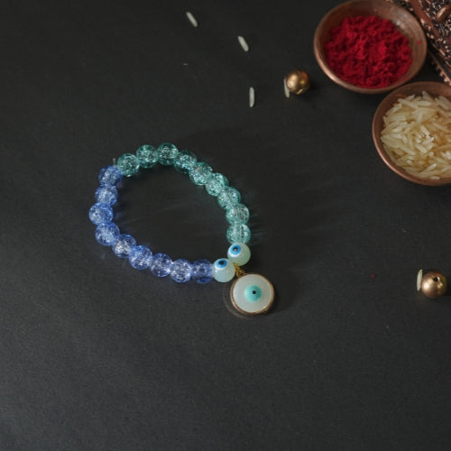 Evil Eye Bracelet Rakhi for Kids – Blue Beaded Design with Handmade Protective Charm