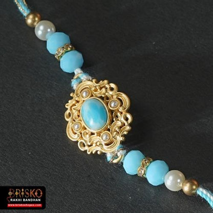 Royal Blue Stone Rakhi – Elegant Handmade Rakhi for Brother