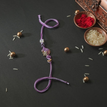 Handmade Rakhi – Purple Thread with Cute Teddy Charm and Beads