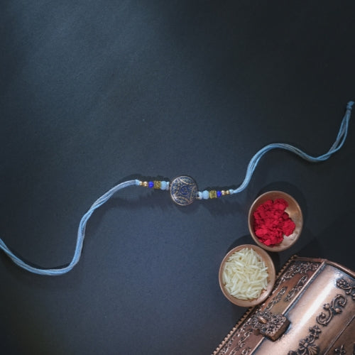 Handmade Rakhi – Blue Thread with Antique Beaded Centerpiece for Brother