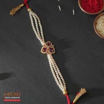 Regal Pearl Bloom Rakhi – Graceful Bond with Every Thread