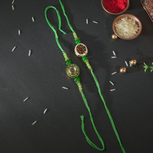 Handmade Bhaiya Bhabhi Rakhi Pair – Green Thread with Kundan & Floral Resin Charm