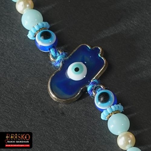 Hamsa Evil Eye Rakhi with Blue Thread – Handmade Nazar Raksha Rakhi for Brother