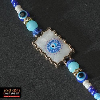 Blue Evil Eye Rakhi with Nazar Suraksha Thread – Handmade Protection Rakhi for Brother