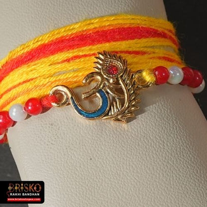 Om Morpankh Rakhi with Yellow-Red Long Cotton Thread – Spiritual Handmade Rakhi for Brother
