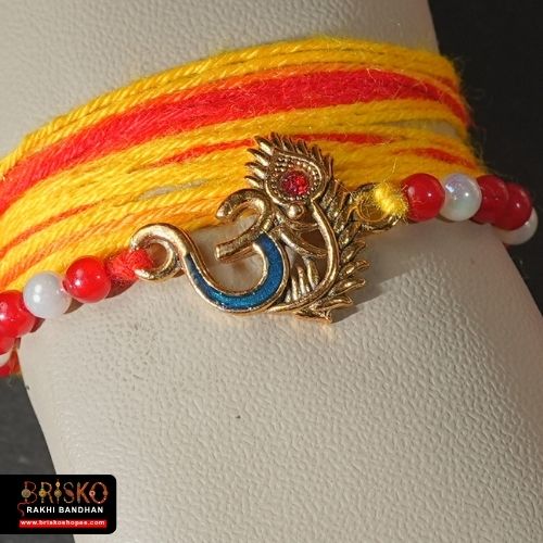 Om Morpankh Rakhi with Yellow-Red Long Cotton Thread – Spiritual Handmade Rakhi for Brother