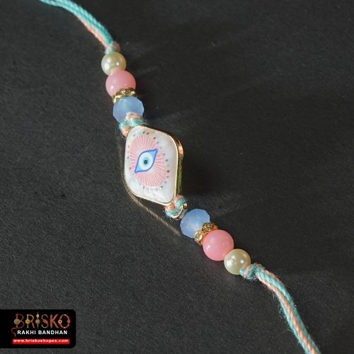 Pastel Evil Eye Handmade Rakhi – Protection & Elegance for Brother