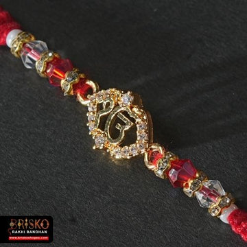 Elegant Ek Onkar Rakhi – Symbol of Divine Unity & Blessings