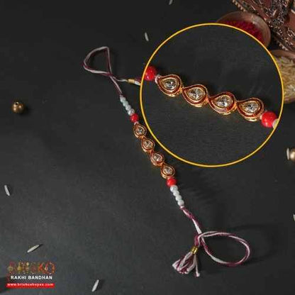 Elegant Teardrop Beaded Rakhi – Grace Woven in Every Thread
