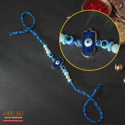 Hamsa Evil Eye Rakhi with Blue Thread – Handmade Nazar Raksha Rakhi for Brother
