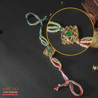 Elegant Pearl Flower Rakhi with Tricolor Thread – Graceful Handmade Rakhi for Brother