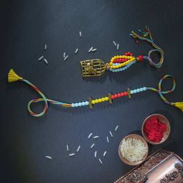 Handmade Bhaiya Bhabhi Rakhi Set – Multicolor Beads with Golden Cage Charm