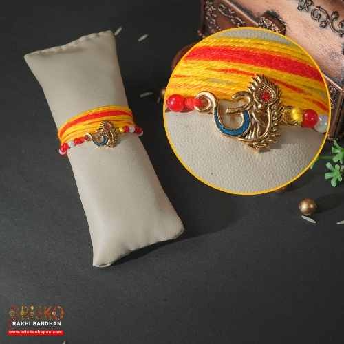 Om Morpankh Rakhi with Yellow-Red Long Cotton Thread – Spiritual Handmade Rakhi for Brother