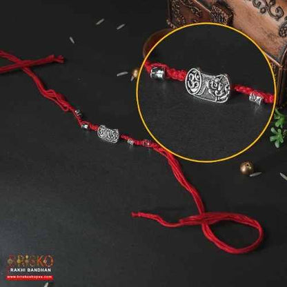 Oxidised Om Rakhi with Red Cotton Thread – Traditional Handmade Rakhi for Brother