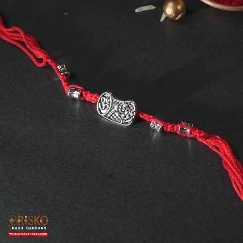 Oxidised Om Rakhi with Red Cotton Thread – Traditional Handmade Rakhi for Brother