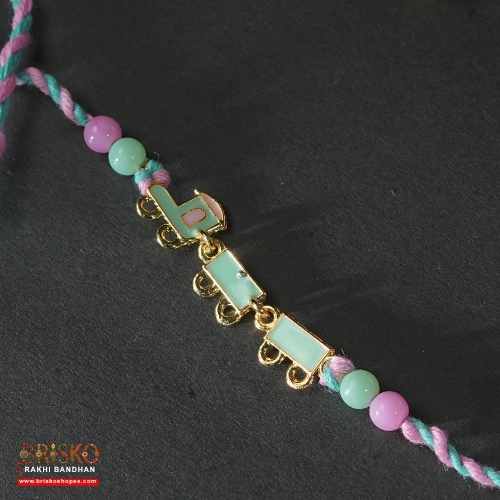 Train Rakhi for Kids – Soft Thread Handmade Rakhi with Pastel Beads and Toy Engine Charm
