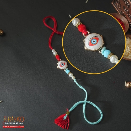 Red & Blue Evil Eye Handmade Rakhi – Stylish Protection for Brother