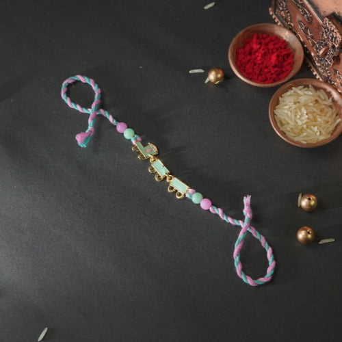 Train Rakhi for Kids – Soft Thread Handmade Rakhi with Pastel Beads and Toy Engine Charm