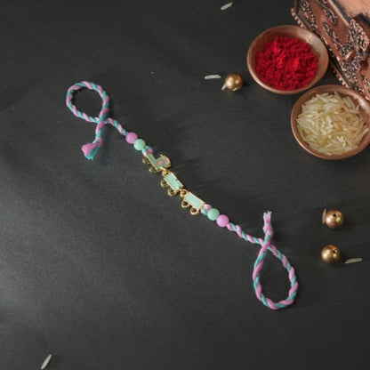Train Rakhi for Kids – Soft Thread Handmade Rakhi with Pastel Beads and Toy Engine Charm