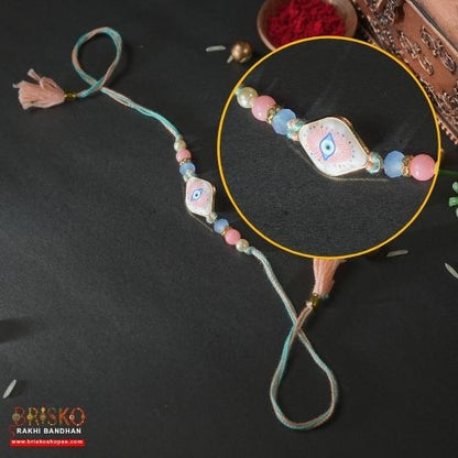 Pastel Evil Eye Handmade Rakhi – Protection & Elegance for Brother