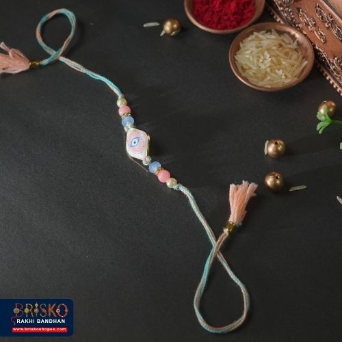 Pastel Evil Eye Handmade Rakhi – Protection & Elegance for Brother