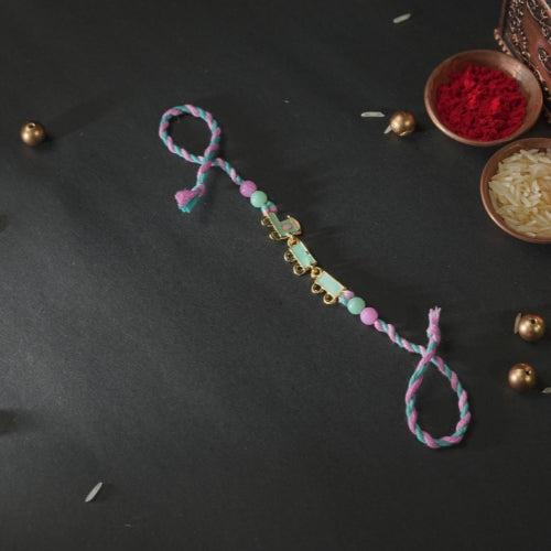 Train Rakhi for Kids – Soft Thread Handmade Rakhi with Pastel Beads and Toy Engine Charm