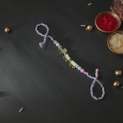 Train Rakhi for Kids – Soft Thread Handmade Rakhi with Pastel Beads and Toy Engine Charm