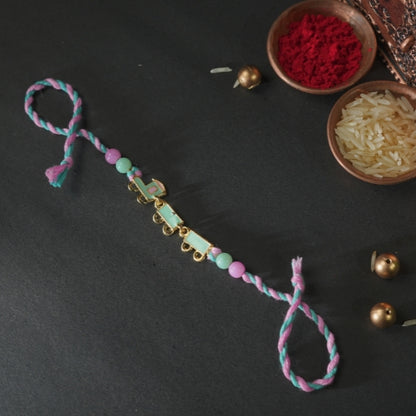 Train Rakhi for Kids – Soft Thread Handmade Rakhi with Pastel Beads and Toy Engine Charm